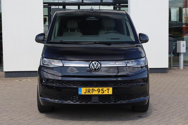 Volkswagen MULTIVAN 1.5 eHybrid L2 Bulli Edition 4Motion Harman & Kardon leder / alcantara 7p Head up area view easy open elektrische achterklep DCC adaptief onderstel 4 x stoelverwarming travel assist 90% privacy glas 19" LMV parkeerpakket plus NL auto 48 mnd 100.000km gara