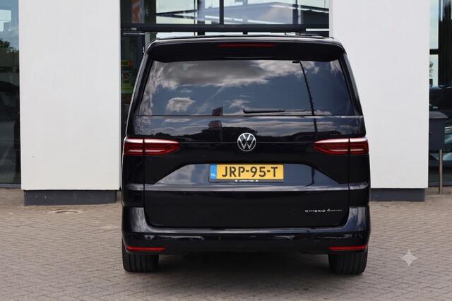 Volkswagen MULTIVAN 1.5 eHybrid L2 Bulli Edition 4Motion Harman & Kardon leder / alcantara 7p Head up area view easy open elektrische achterklep DCC adaptief onderstel 4 x stoelverwarming travel assist 90% privacy glas 19" LMV parkeerpakket plus NL auto 48 mnd 100.000km gara