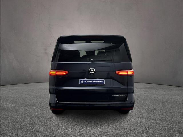 Volkswagen MULTIVAN 1.5 eHybrid L2 Bulli Edition 4Motion | Prijs is INCL. BTW/BPM !| 7 zits via-a-vis zitopstelling | Elec. schuifdeuren & achterklep | Trekhaak | 19" | TravelAssist | Verwarmd stuur & stoelen