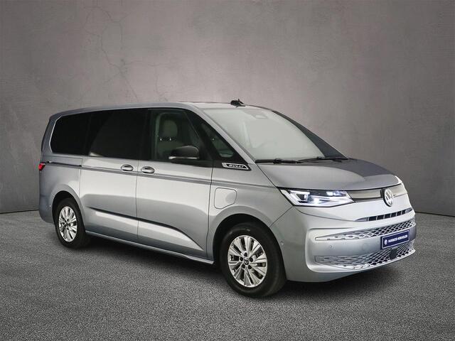 Volkswagen MULTIVAN 1.5 eHybrid L2 4Motion | incl. BTW/BPM ! | 7-zits | IQ Matrix LED Koplampen | Wegklapbare trekhaak | Travel Assist | Elec. achterklep | Multifunctionele tafel | Stoelverwarming