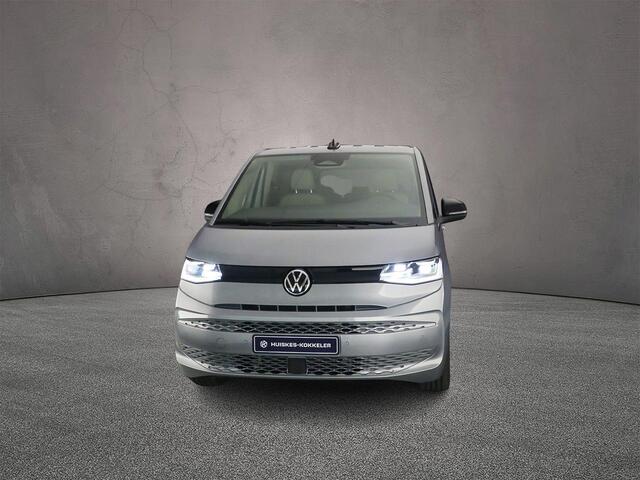 Volkswagen MULTIVAN 1.5 eHybrid L2 4Motion | incl. BTW/BPM ! | 7-zits | IQ Matrix LED Koplampen | Wegklapbare trekhaak | Travel Assist | Elec. achterklep | Multifunctionele tafel | Stoelverwarming