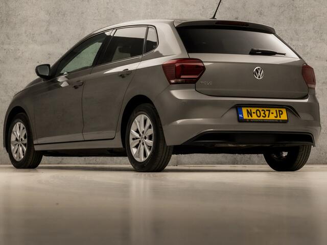 Volkswagen POLO 1.0 TSI Highline Sport Automaat (APPLE CARPLAY, GROOT NAVI, CLIMATE, STOELVERWARMING, SPORTSTOELEN, GETINT GLAS, LM VELGEN, ADAPTIVE CRUISE, NIEUWSTAAT)