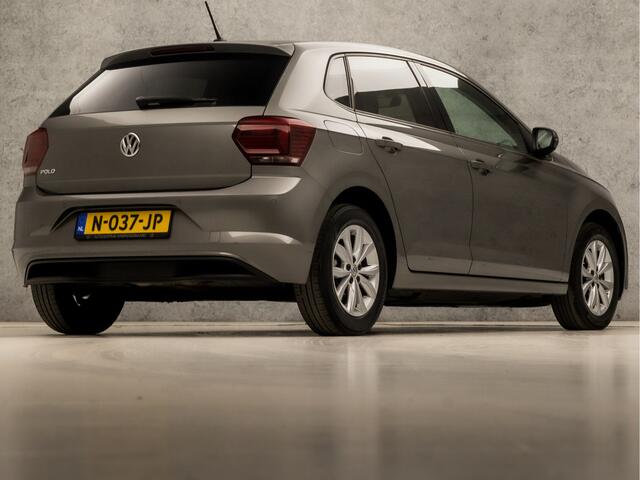 Volkswagen POLO 1.0 TSI Highline Sport Automaat (APPLE CARPLAY, GROOT NAVI, CLIMATE, STOELVERWARMING, SPORTSTOELEN, GETINT GLAS, LM VELGEN, ADAPTIVE CRUISE, NIEUWSTAAT)
