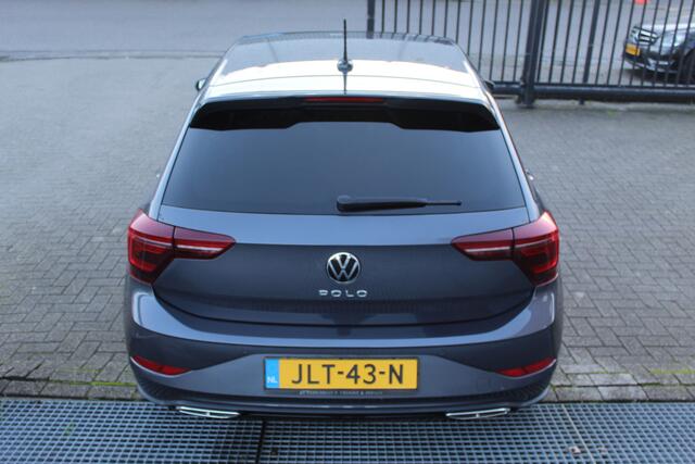 Volkswagen POLO 1.0 TSI R-Line Automaat/Navigatie/Virtual cockpit/Adaptive cruise control/Spraakbediening/Achteruitrijcamera/Parkeersensoren rondom/Apple carplay/Stoelverwarming/LED grill/IQ.light/Climate control/Draadloze telefoonlader/DAB/17''Lichtmetalen velgen.
