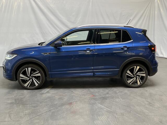 Volkswagen T-Cross 1.5 TSI R-Line / AUTOMAAT/ 150 PK/ 2X R-LINE/ ADAPT. CRUISE/ KEYLESS/ PARK. SENSOREN + CAMERA/ APP-CONNECT/ RIJ-MODI/ CLIMA/ NAVI/ 18" LMV/ DAB/ STOEL VERWARM./ DIGITAL DASH