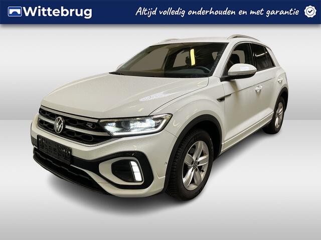 Volkswagen T-Roc 1.5 TSI R-Line / AUTOMAAT/ GARANTIE TM 04-2027/ STUUR+STUUR VERWARM./ TREKHAAK/ ELEK. ACHTERKLEP/ CAMERA/ PARK. SENSOREN V+A/ APP-CONNECT/ KEYLESS/ DRIVE SELECT/ DODE HOEK/ NAVI/ DAB/ LED/ ACC/ CLIMA/ ISOFI