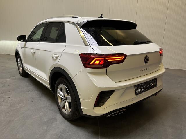 Volkswagen T-Roc 1.5 TSI R-Line / AUTOMAAT/ GARANTIE TM 04-2027/ STUUR+STUUR VERWARM./ TREKHAAK/ ELEK. ACHTERKLEP/ CAMERA/ PARK. SENSOREN V+A/ APP-CONNECT/ KEYLESS/ DRIVE SELECT/ DODE HOEK/ NAVI/ DAB/ LED/ ACC/ CLIMA/ ISOFI