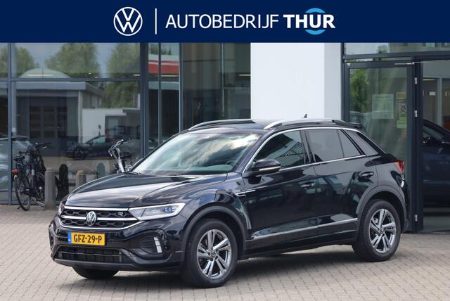 Volkswagen T-Roc 1.5 TSI R-Line Achteruitrijcamera trekhaak afneembaar privacy glas alarm ergo stoelen met leder alcantara stoel en stuurwiel verwarming ACC park assist navigatie 17" LMV valencia spiegel pakket