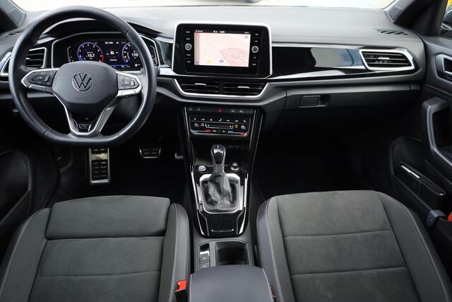 Volkswagen T-Roc 1.5 TSI R-Line Achteruitrijcamera trekhaak afneembaar privacy glas alarm ergo stoelen met leder alcantara stoel en stuurwiel verwarming ACC park assist navigatie 17" LMV valencia spiegel pakket