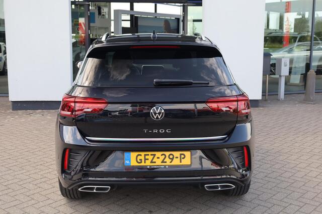 Volkswagen T-Roc 1.5 TSI R-Line Achteruitrijcamera trekhaak afneembaar privacy glas alarm ergo stoelen met leder alcantara stoel en stuurwiel verwarming ACC park assist navigatie 17" LMV valencia spiegel pakket