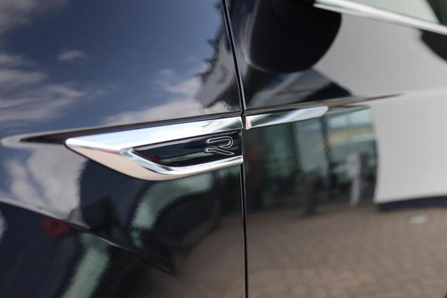 Volkswagen T-Roc 1.5 TSI R-Line Achteruitrijcamera trekhaak afneembaar privacy glas alarm ergo stoelen met leder alcantara stoel en stuurwiel verwarming ACC park assist navigatie 17" LMV valencia spiegel pakket