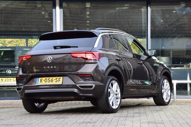 Volkswagen T-Roc 1.5 TSI Sport Business R DSG Automaat | BOVAG Garantie | Trekhaak | Virtual Cockpit | Navigatie | Achteruitrijcamera | 18'' Velgen Met All Season Banden | Adaptive Cruise | Stoelverwarming |