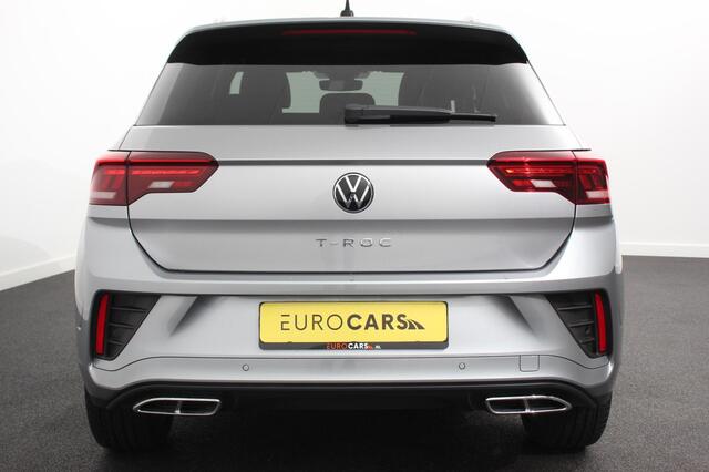 Volkswagen T-Roc 1.5 TSI 150pk DSG R-Line | Navigatie | Apple Carplay/Android Auto | Parkeersensoren | Camera | Blind Spot Assist | Adaptive Cruise Control | Elektrische achterklep | Stoel- en stuurverwarming | Climate Control | Ledverlichting | Virtual Cockpit