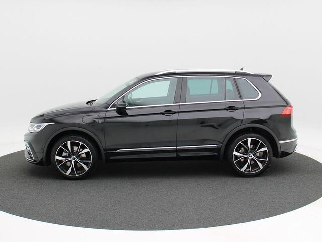 Volkswagen TIGUAN 1.4 TSi 145 Pk eHybrid R-Line Business Automaat | Trekhaak | LED | Stoel en Stuur Verwarming | Adaptive Cruise | Carplay | Navigatiesysteem | Parkeersensoren | Camera | Elektrische Achterklep | 20 Inch | 30.380 Km!!
