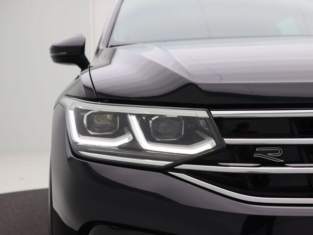 Volkswagen TIGUAN 1.4 TSi 145 Pk eHybrid R-Line Business Automaat | Trekhaak | LED | Stoel en Stuur Verwarming | Adaptive Cruise | Carplay | Navigatiesysteem | Parkeersensoren | Camera | Elektrische Achterklep | 20 Inch | 30.380 Km!!