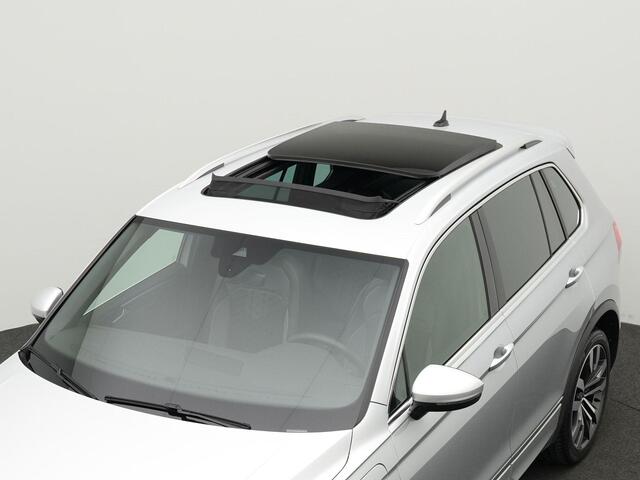 Volkswagen TIGUAN 1.4 TSI 245 pk DSG eHybrid R-Line Business | Panoramadak | Trekhaak | Rondomzicht camera | Adaptief onderstel | Stuur-/stoelverwarming