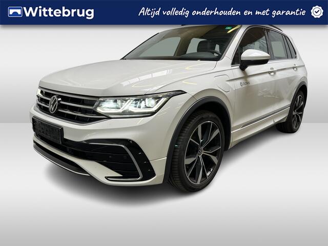 Volkswagen TIGUAN 1.4 TSI eHybrid R-Line / AUTOMAAT/ 245 PK/ PANO/ LEER/ STUUR+STOEL VERWARM./ ELEK. ACHTERKLEP/ TREKHAAK/ PARK.SENSOR.V+A/ CAMERA/ DCC/ APP-CONNECT/ MEMORY SEATS/ ACC/ NAVI/ CLIMA/ DAB/ 20'' LMV