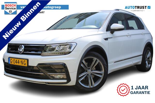 Volkswagen TIGUAN 1.5 TSI Comfortline Business R-Line | Incl. 12 maanden Garantie | Panorama dak | Stoelmassage | Virtual cockpit | Schuif/kantel dak | Stoelverwarming | Keyless entry/start | Elektrische kofferklep | Trekhaak | Parkeersensoren V+A | Climate controle | Navi