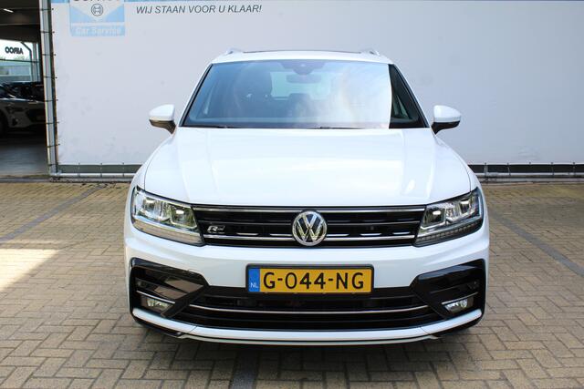 Volkswagen TIGUAN 1.5 TSI Comfortline Business R-Line | Incl. 12 maanden Garantie | Panorama dak | Stoelmassage | Virtual cockpit | Schuif/kantel dak | Stoelverwarming | Keyless entry/start | Elektrische kofferklep | Trekhaak | Parkeersensoren V+A | Climate controle | Navi