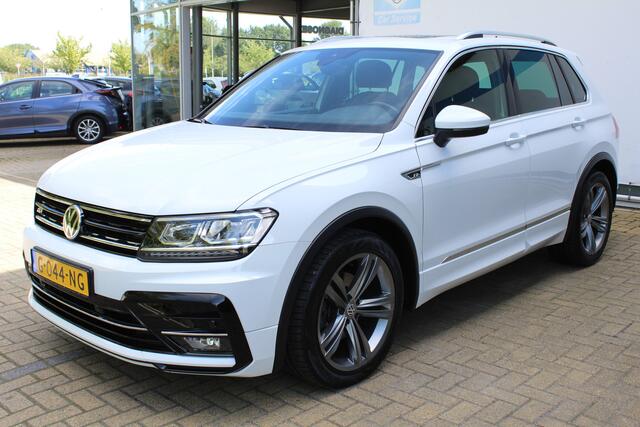 Volkswagen TIGUAN 1.5 TSI Comfortline Business R-Line | Incl. 12 maanden Garantie | Panorama dak | Stoelmassage | Virtual cockpit | Schuif/kantel dak | Stoelverwarming | Keyless entry/start | Elektrische kofferklep | Trekhaak | Parkeersensoren V+A | Climate controle | Navi