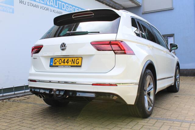 Volkswagen TIGUAN 1.5 TSI Comfortline Business R-Line | Incl. 12 maanden Garantie | Panorama dak | Stoelmassage | Virtual cockpit | Schuif/kantel dak | Stoelverwarming | Keyless entry/start | Elektrische kofferklep | Trekhaak | Parkeersensoren V+A | Climate controle | Navi