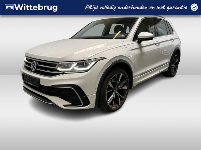 Volkswagen TIGUAN 1.4 TSI eHybrid R-Line / AUTOMAAT/ 245 PK/ 2X R-LINE/ HEAD-UP DISPLAY/ KEYLESS/ DIGITAL DASH/ APP-CONNECT/ NAVI/ RIJ-MODI/ PARK. SENSOREN + CAMERA/ MATRIX/ CLIMA/ ADAPT. CRUISE/ STOEL-STUUR VERWARM.