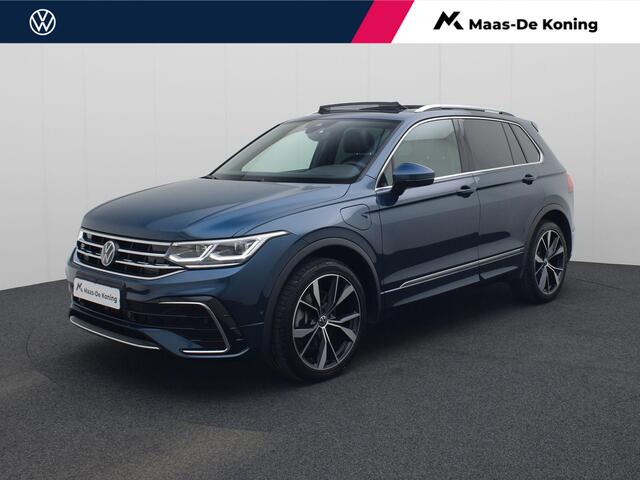Volkswagen TIGUAN 1.4 TSIeHybrid 180kW/245PK R-Line DSG · Panoramadak · Leder · Trekhaak · Camera · Elektrische stoelverstelling ·