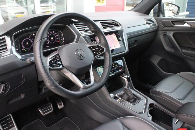Volkswagen TIGUAN 1.4 TSI 245PK eHybrid R-LINE BUSINESS + | BEKLEDING LEDER VIENNA | PANORAMISCH SCHUIF/KANTEL DAK | ELEKTRISCH WEGKLAPENBARE TREKHAAK | R-LINE INTERIEUR/EXTERIEUR | VERWARMBARE VOORSTOELEN/STUUR | ELEKTRISCH BEDIENBARE VOORSTOELEN MET GEHEUGEN FUNCTIE | AK