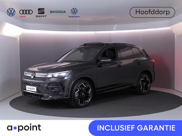 Volkswagen TIGUAN 1.5 eHybrid R-Line Edition 272 pk Automaat (DSG) | Verlengde garantie | Navigatie | Panoramadak | Trekhaak (wegklapbaar) | Parkeersensoren (Park assist) | Rondomzicht camera| Lederen bekleding | Stoelverwarming v/a | R-Line |