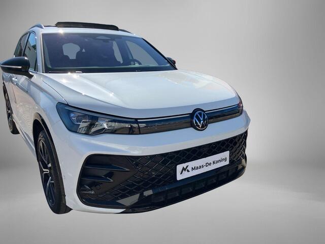 Volkswagen TIGUAN 1.5eHybrid 150kW/204PK R-Line Black Style · Leder · Harman Kardon · Panoramadak · Trekhaak · 360°Camera + Parkeersensoren · Garantie t/m 11-05-2030 of 100000km.