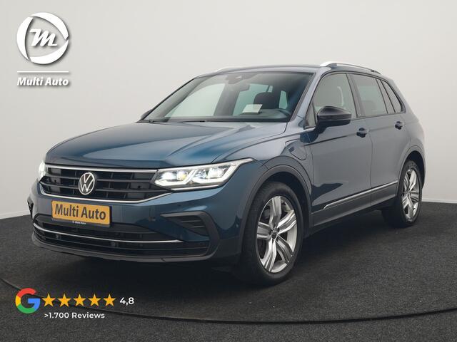 Volkswagen TIGUAN 1.4 TSI eHybrid Active PHEV 245pk Dealer O.H. | Trekhaak Af Fabriek | Adaptive Cruise | Head Up | IQ Light | Keyless | Blis | Sportstoelen & Stuur Verwarmd | Sfeerverlichting | Apple Carplay | Navigate | DAB | 19"L.M | Plug In Hybrid |