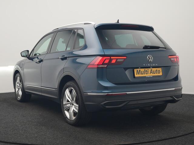 Volkswagen TIGUAN 1.4 TSI eHybrid Active PHEV 245pk Dealer O.H. | Trekhaak Af Fabriek | Adaptive Cruise | Head Up | IQ Light | Keyless | Blis | Sportstoelen & Stuur Verwarmd | Sfeerverlichting | Apple Carplay | Navigate | DAB | 19"L.M | Plug In Hybrid |