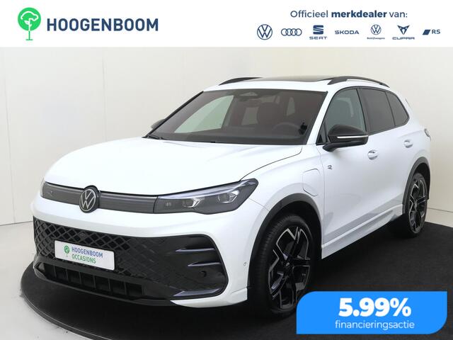 Volkswagen TIGUAN 1.5 eHybrid R-Line Edition | SoH 99% | Panoramadak | Lederen bekleding 'Varenna' | Trekhaak | Harman/kardon | Head-up display | Adaptieve demping | Black style | Stoelventilatie voor |