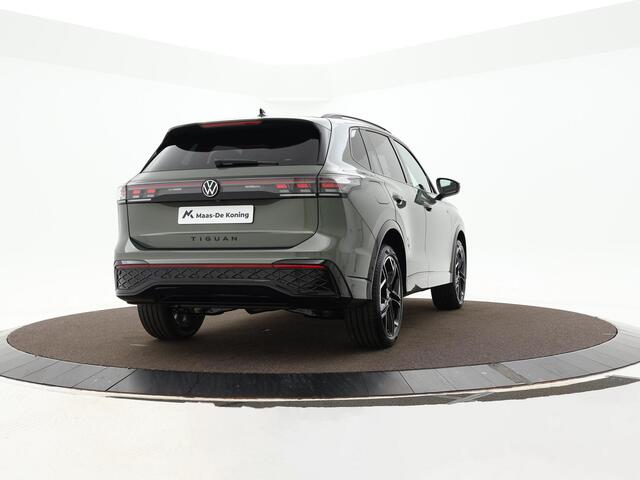 Volkswagen TIGUAN R-Line Edition 1.5 eHybrid 204 PK 6 versn. DSG · Achteruitrijcamera · Rondomzichtcamera · Lederen Bekleding · Draadloze telefoonlader · Black Style Pakket · Trekhaak inklapbaar, met elektrische ontgrendeling, incl. aanhangermanoeuvreerhulp Trailer Assist 
