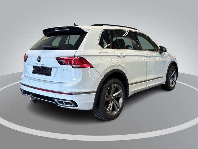 Volkswagen TIGUAN 1.4 TSI eHybrid 245pk DSG R-Line Business · Camera · Inklap. Trekhaak · Dodehoeksensor · Parkeer Assistent · Stuur- & Stoelverwarming · 19"Velgen ·