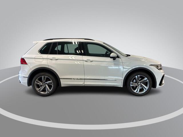 Volkswagen TIGUAN 1.4 TSI eHybrid 245pk DSG R-Line Business · Camera · Inklap. Trekhaak · Dodehoeksensor · Parkeer Assistent · Stuur- & Stoelverwarming · 19"Velgen ·