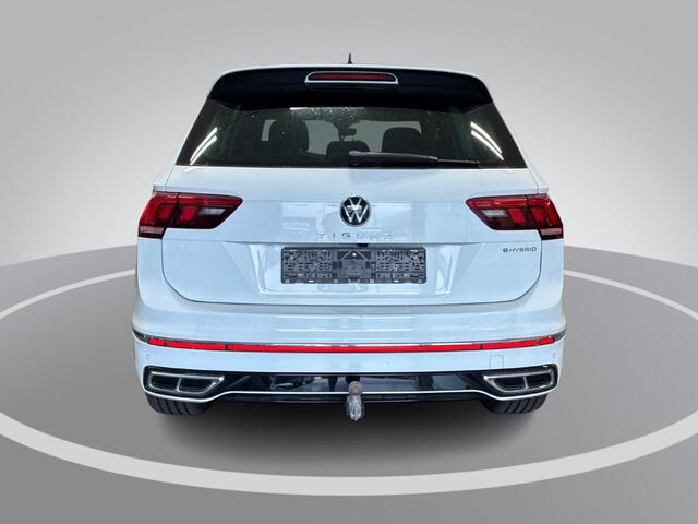Volkswagen TIGUAN 1.4 TSI eHybrid 245pk DSG R-Line Business · Camera · Inklap. Trekhaak · Dodehoeksensor · Parkeer Assistent · Stuur- & Stoelverwarming · 19"Velgen ·