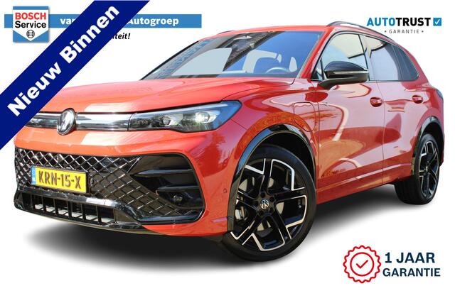 Volkswagen TIGUAN 1.5 eHybrid R-Line Edition | Incl. 12 maanden Garantie | Panorama dak | Elektrisch wegklapbare trekhaak | Massage stoelen | Elektrisch verstelbare stoelen met memory | Head-Up Display | Stoelverwarming/ventilatie | 360° Camera | Harman/Kardon Audiosysteem
