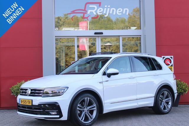 Volkswagen TIGUAN 1.5 TSI 150PK AUTOMAAT HIGHLINE BUSINESS R | PANORAMA SCHUIF/KANTEL DAK | LEDEREN BEKLEDING | BESTUUDERSSTOEL ELEKTRISCH VERSTELBAAR MET GEHEUGENFUNCTIE | ELEKTRISCH WEGKLAPBARE TREKHAAK | IQ LIGHT KOPLAMPEN | VIRTUAL DISPLAY | DRAADLOZE APPLE CARPLAY/ANDROID AUTO | NAVIGATIE | 19" LICHTMETALEN VELGEN | ELEKTRISCH BEDIENBARE ACHTERKLEP | GETINTE ACHTERRUITEN | CAMERA VOOR + ACHTER | PARKEERSENSOREN VOOR + ACHTER | STOEL VERWARMING |