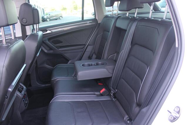 Volkswagen TIGUAN 1.5 TSI 150PK AUTOMAAT HIGHLINE BUSINESS R | PANORAMA SCHUIF/KANTEL DAK | LEDEREN BEKLEDING | BESTUUDERSSTOEL ELEKTRISCH VERSTELBAAR MET GEHEUGENFUNCTIE | ELEKTRISCH WEGKLAPBARE TREKHAAK | IQ LIGHT KOPLAMPEN | VIRTUAL DISPLAY | DRAADLOZE APPLE CARPLAY/ANDROID AUTO | NAVIGATIE | 19" LICHTMETALEN VELGEN | ELEKTRISCH BEDIENBARE ACHTERKLEP | GETINTE ACHTERRUITEN | CAMERA VOOR + ACHTER | PARKEERSENSOREN VOOR + ACHTER | STOEL VERWARMING |