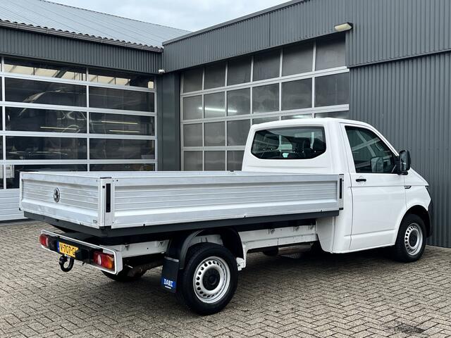Volkswagen TRANSPORTER 2.0 TDI L2H1 150pk Pick up open laadbak Airco Cruise control Bluetooth trekhaak 2500 kg 1e eigenaar Dealer onderhouden P-up Bakwagen Doka Pritsche Ahk 2500kg