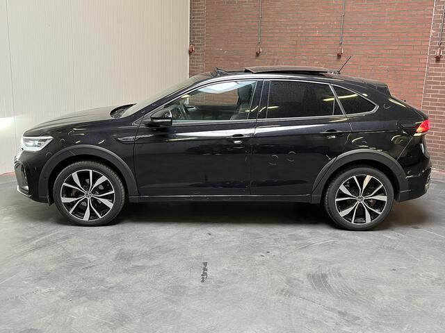 Volkswagen Taigo 1.5 TSI R-Line / AUTOMAAT/ 2X R-LINE/ PANO/ GARANTIE TM 10-2027/ TREKHAAK/ DIGITAL DASH/ KEYLESS/ MATRIX/ PARK. SENSOREN + CAMERA/ APP-CONNECT/ RIJ-MODI/ ADAPT. CRUISE/ CLIMA