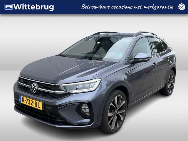 Volkswagen Taigo 1.5 TSI R-Line / AUTOMAAT/ 2X R-LINE/ 150 PK/ ADAPTIVE CRUISE/ PARK.SENSOREN V+A/ CAMERA/ APP-CONNECT/ STOELVERWARM./ KEYLESS/ DIGITAL DASH/ DAB/ NAVI/ CLIMA/ LED/ IQ.LIGHT/ 18'' LMV