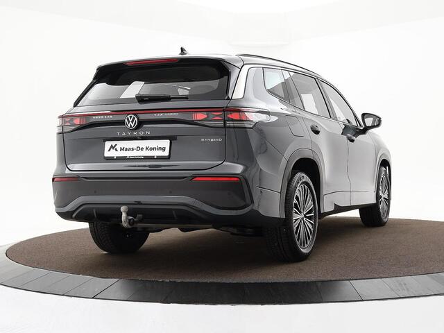 Volkswagen Tayron 1.5 eHybrid 204pk DSG Life Edition · SOH 100% · Camera · Inklap. Trekhaak · Stuur- & Stoelverwarming · Side Assist · Sfeerverlichting · ACC · Parkeerassistent ·