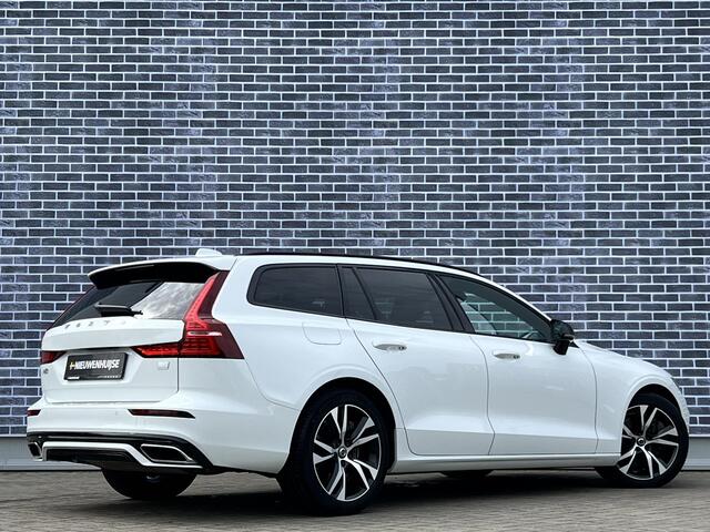 Volvo V60 2.0 T6 Recharge AWD R-Design | Stoel- en stuurwielverwarming | Navigatie | Achteruitrijcamera | Apple Carplay / Android Auto | DAB+ radio | Keyless | LED koplampen | Sportstoelen | Elektrische stoelverstelling |