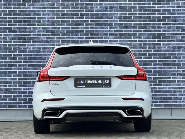 Volvo V60 2.0 T6 Recharge AWD R-Design | Stoel- en stuurwielverwarming | Navigatie | Achteruitrijcamera | Apple Carplay / Android Auto | DAB+ radio | Keyless | LED koplampen | Sportstoelen | Elektrische stoelverstelling |