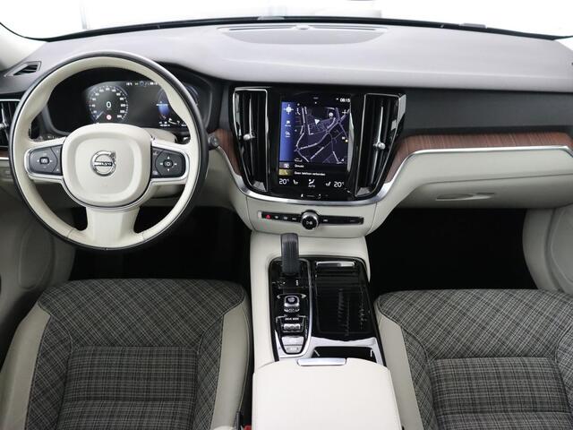 Volvo V60 2.0 T6 Twin Engine AWD Momentum Pro | SOH 88% | Stoelverwarming | Adaptive cruise | Carplay | Half leder | Navigatie | Full LED | Parkeerhulp | Climate control | Bluetooth | PHEV | Plug In