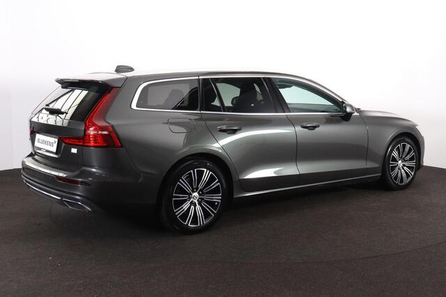 Volvo V60 T6 Recharge AWD Inscription - Sensus navigatie - Elektr. bedienbare bestuurderstoel - Verwarmbare voorstoelen & stuurwiel - Parkeersenoren achter - Achteruitrijcamera - Keyless - Cruise Control - Extra getint glas - 18 inch LMV