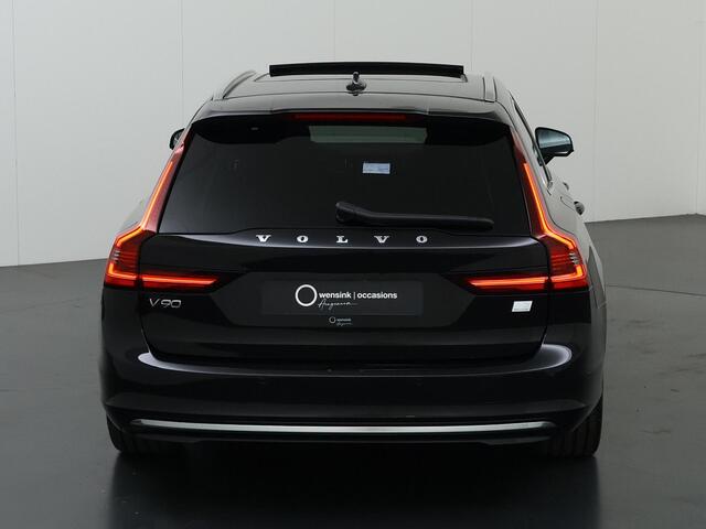 Volvo V90 2.0 T6 Plug-in hybrid AWD Plus Bright | Panoramadak | Trekhaak | Full Led Koplapen| Camera | Verwarmde achterbank | Apple CarPlay/Android Auto | Harman/Kardon Audio | Comfortstoelen | Adaptieve Cruise Control | DAB | Ele. verstelbare stoelen + Geheugen |