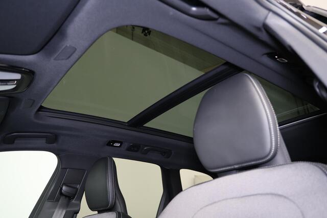 Volvo XC60 T6 Recharge AWD Plus Black Edition - LONG RANGE - Luchtvering - Panorama/schuifdak - IntelliSafe Assist & Surround - 360º Camera - Adaptieve LED koplampen - Verwarmde voorstoelen, stuur & achterbank - Parkeersensoren voor & achter - Elektr. bedienb. voors